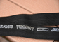 Dây đai vải thun màu đen 2cm được in với logo chữ trắng cắt ra